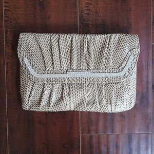 Snake print clutch